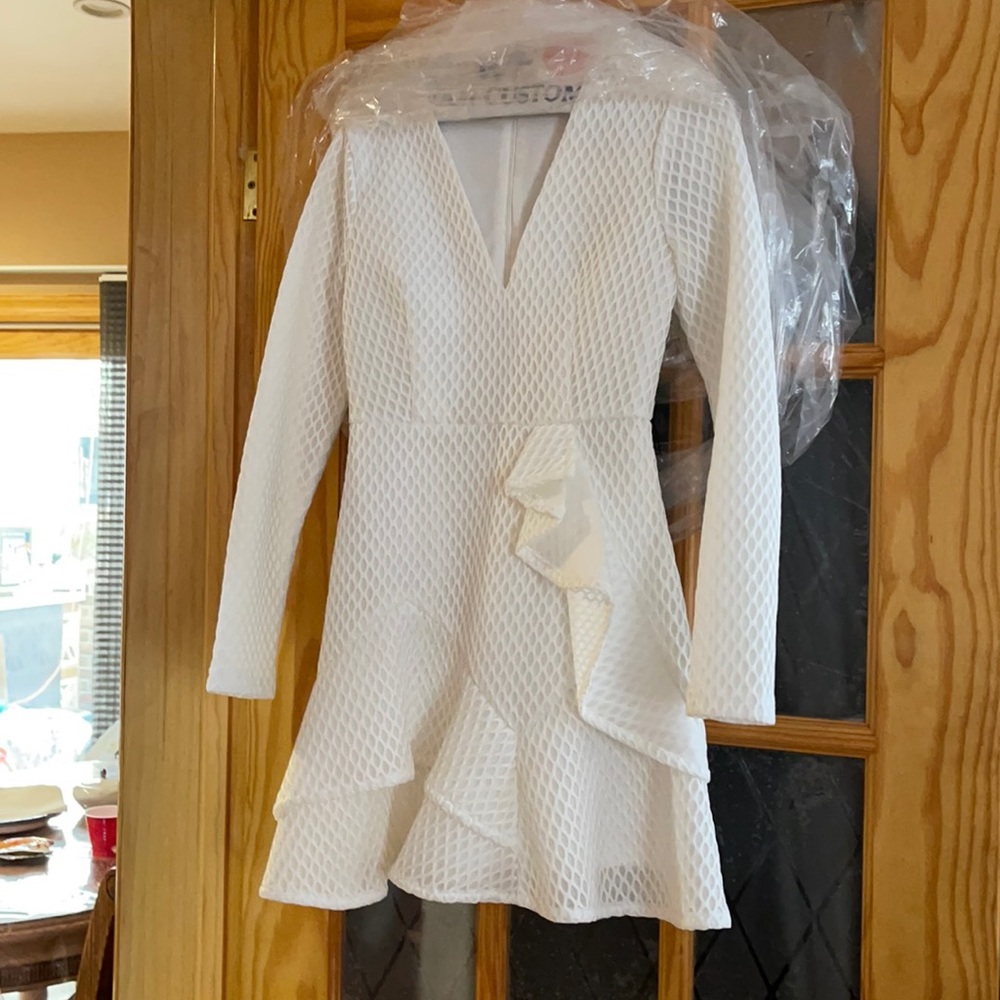 Dry cleaned white long sleeve mini dress